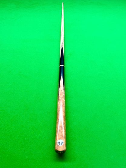 Close-up of Cue Creator cue with burl wood secondary splices and titanium ferrule