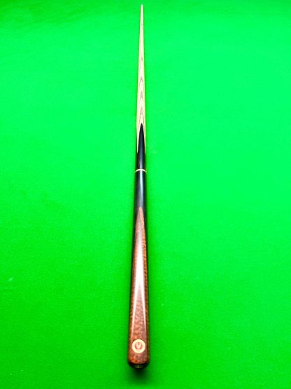 Full-length view of Demon Snakewood Ultimate 44 snooker cue with ash shaft and snakewood butt